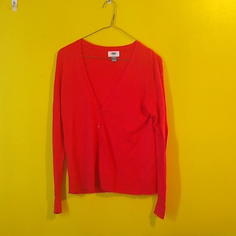 A button up red cardigan.